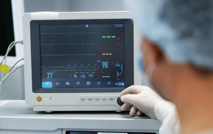 doctor-monitoring-patient-s-pulse (1)(1)